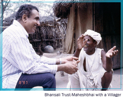 Bhansali trust - Maheshbhai with a villager